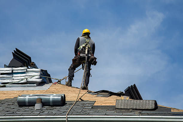 Professional Roofing technician working in Center Cross, VA